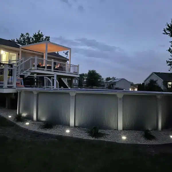 multi-level-pool-deck-with-outdoor-lighting-and-renovated-landscape-scaled-