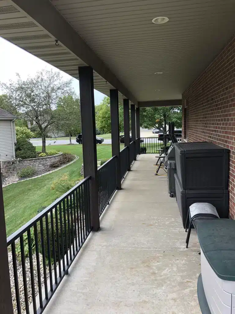 photo of a wrap-around porch with railings